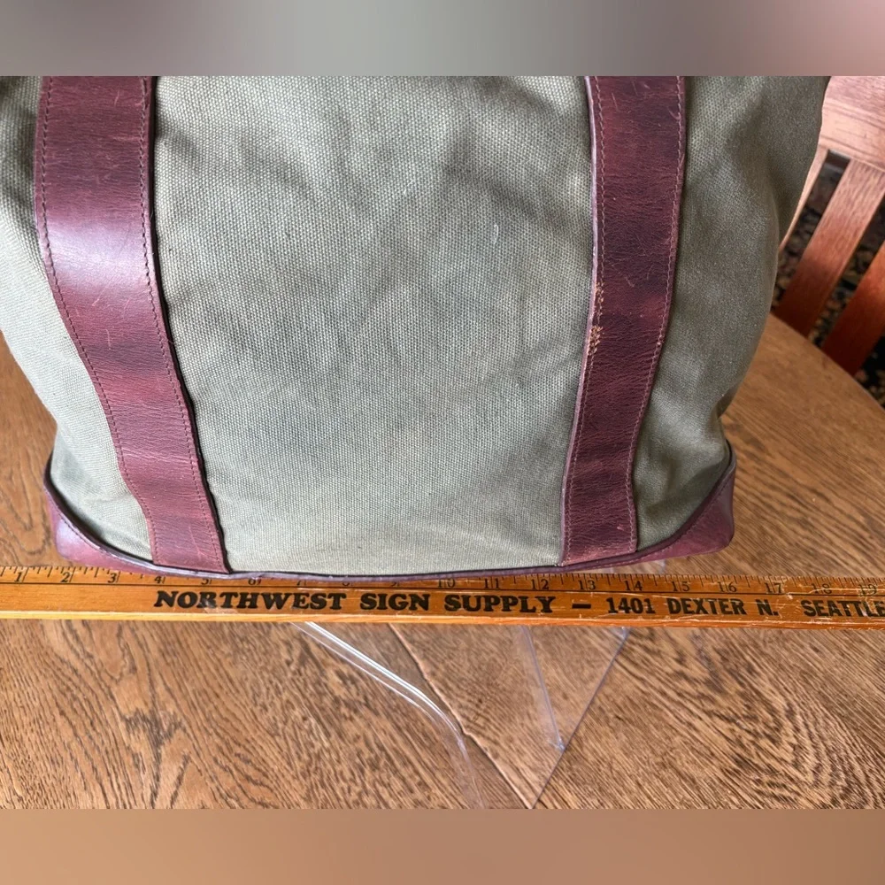 Vintage Eddie Bauer, green canvas w/leather trim handles/bottom top snap closure